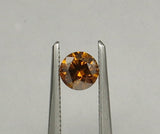 0.53 carat Round diamond  Orange SI2