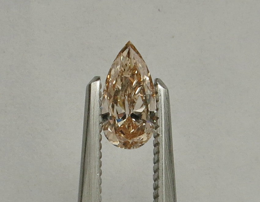 0.46 carat Pear diamond  Orange SI1