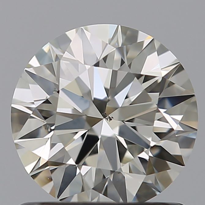 0.90 carat Round diamond J  SI1 Excellent