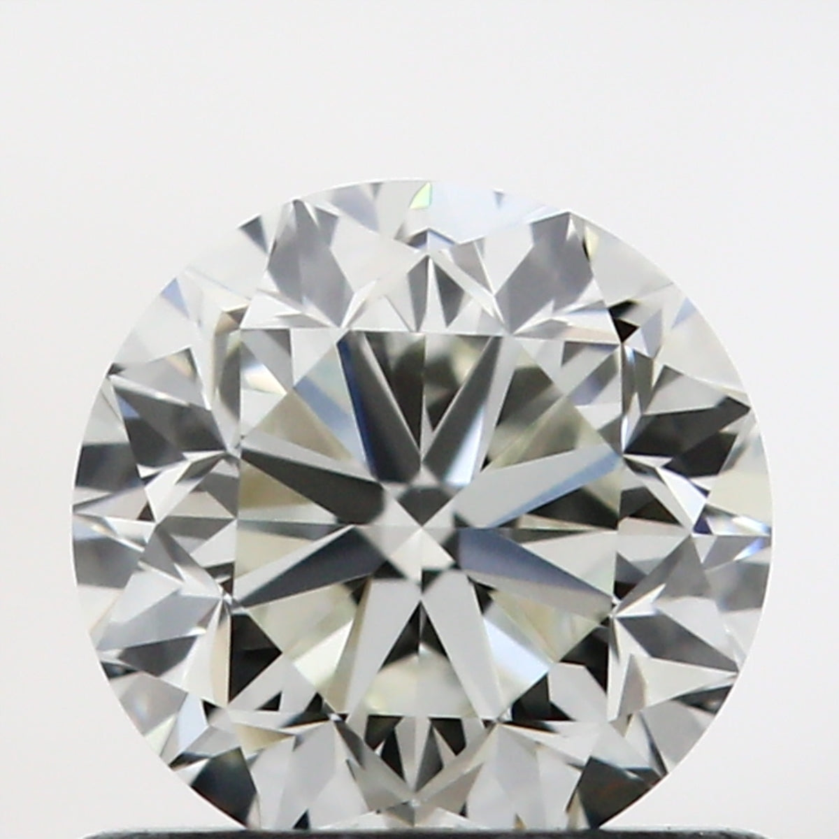 0.71 carat Round diamond J  IF Good