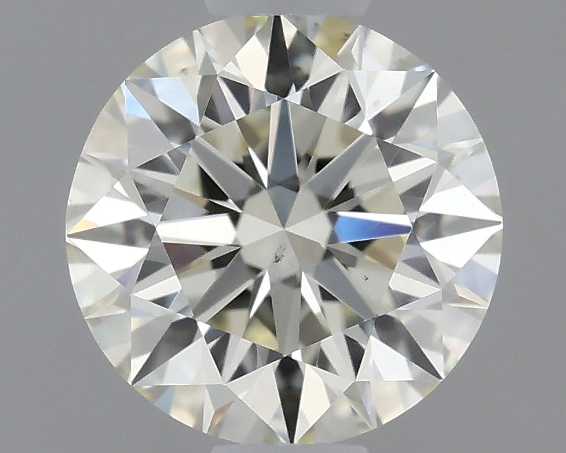 0.61 carat Round diamond M VS2 Excellent
