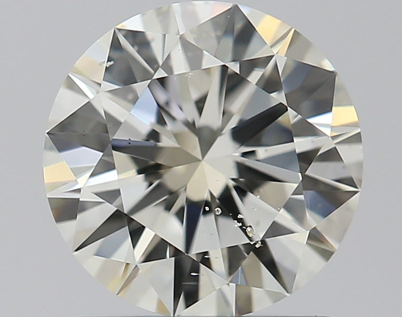 0.90 carat Round diamond J  SI2 Excellent