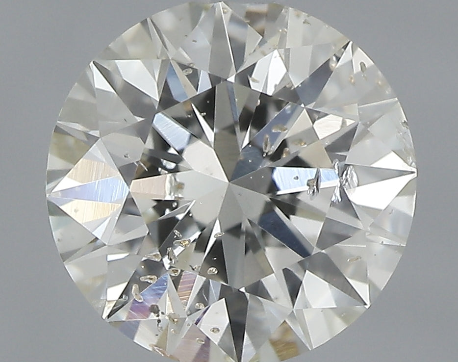 0.90 carat Round diamond J  SI2 Excellent